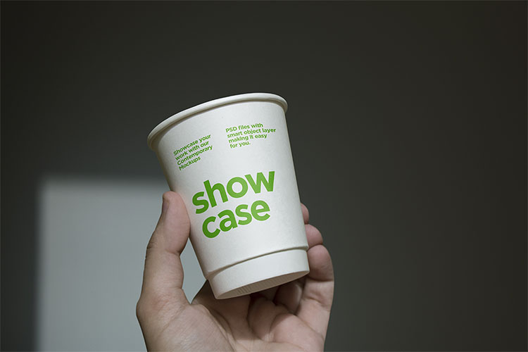 Free Paper Coffee Cup in Hand PSD Mockup