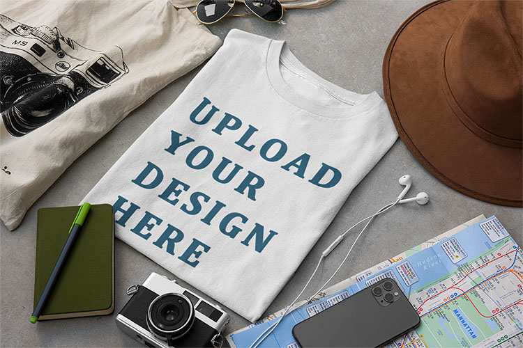 Free T-Shirt Mockup Surrounded by Travel Accessories
